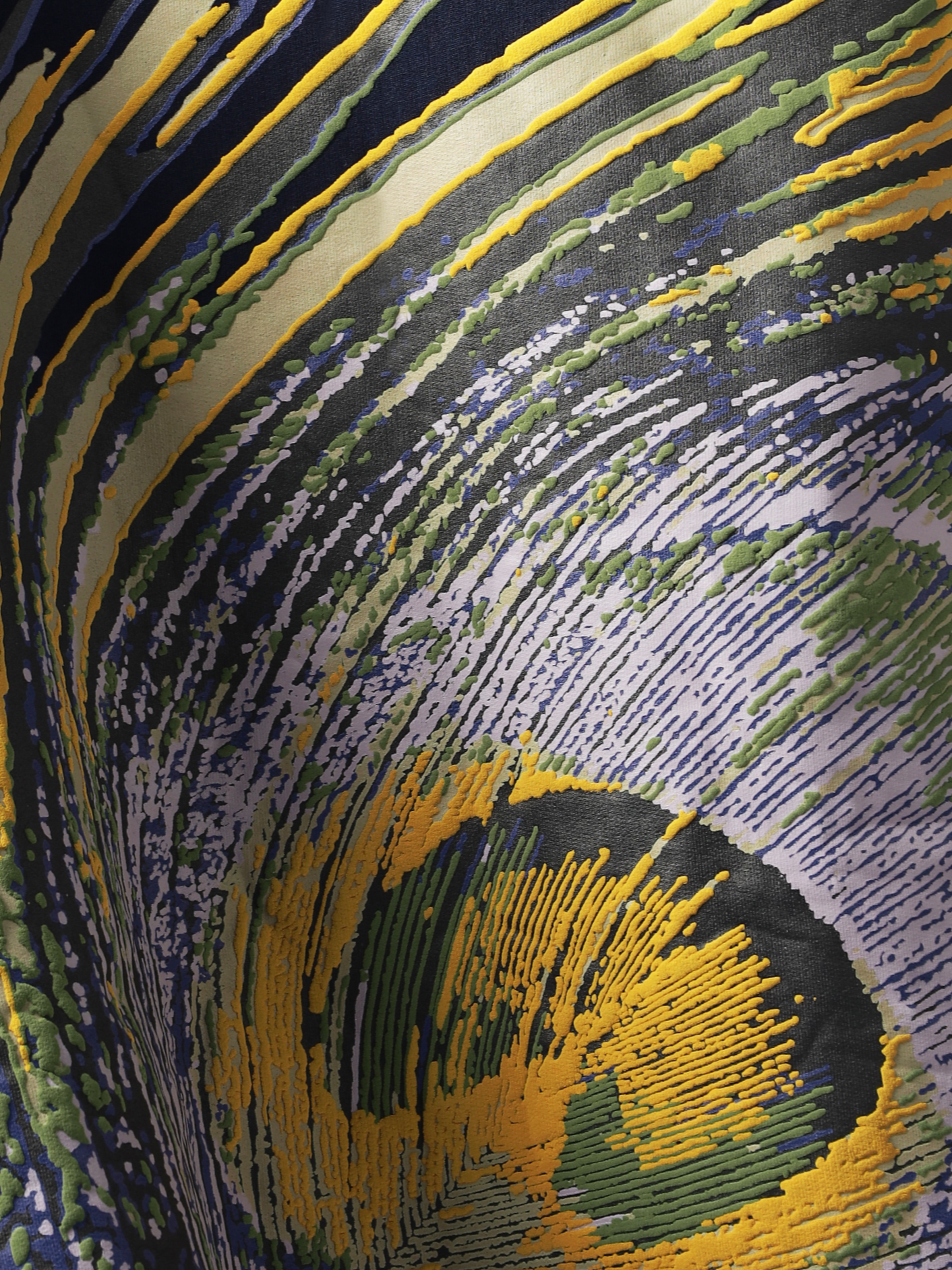 Closeup of the back print on Navy peacock feather oversized t-shirt.