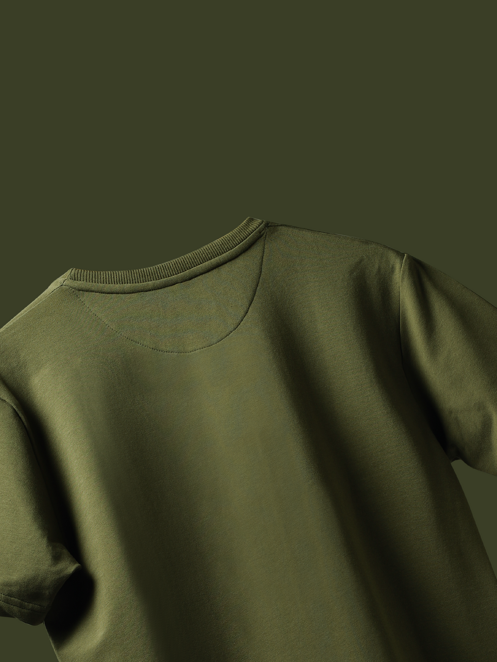 Jayhues olive green basic t-shirt back side on a dark green background