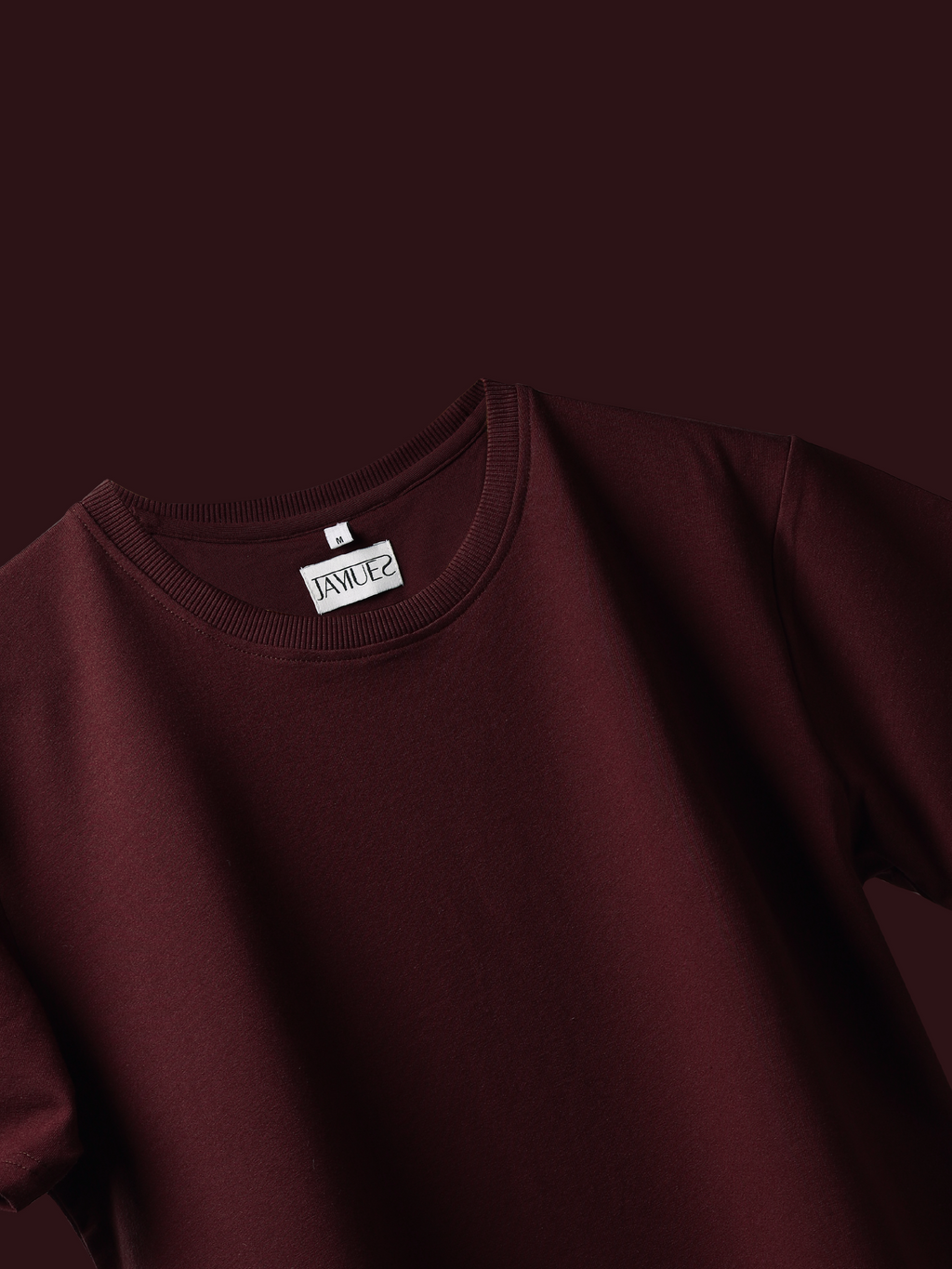 Jayhues Burgundy basic t-shirt with a brand label on a dark background