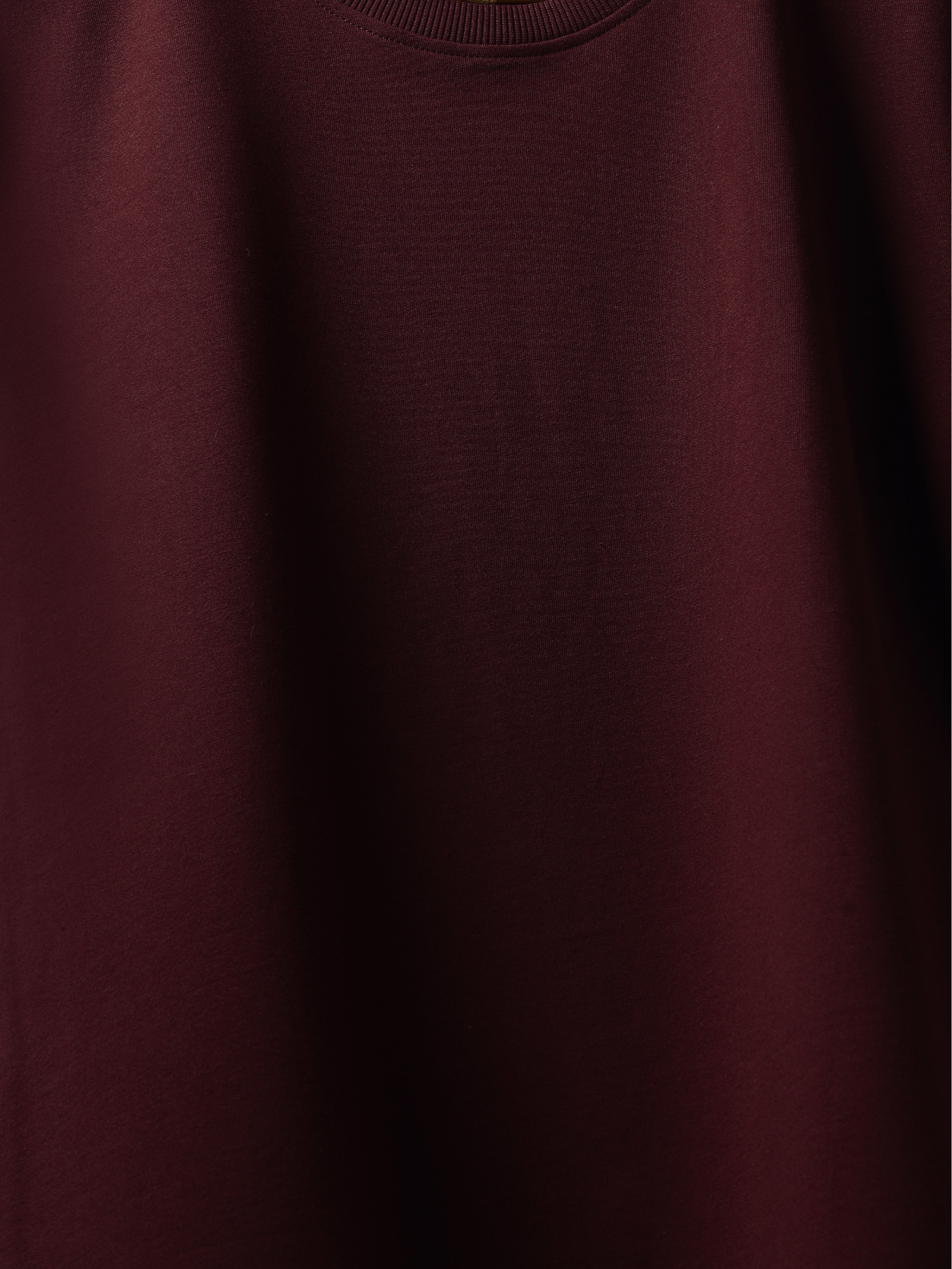 Close-up of a burgundy fabric texture