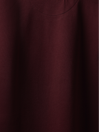 Close-up of a burgundy fabric texture