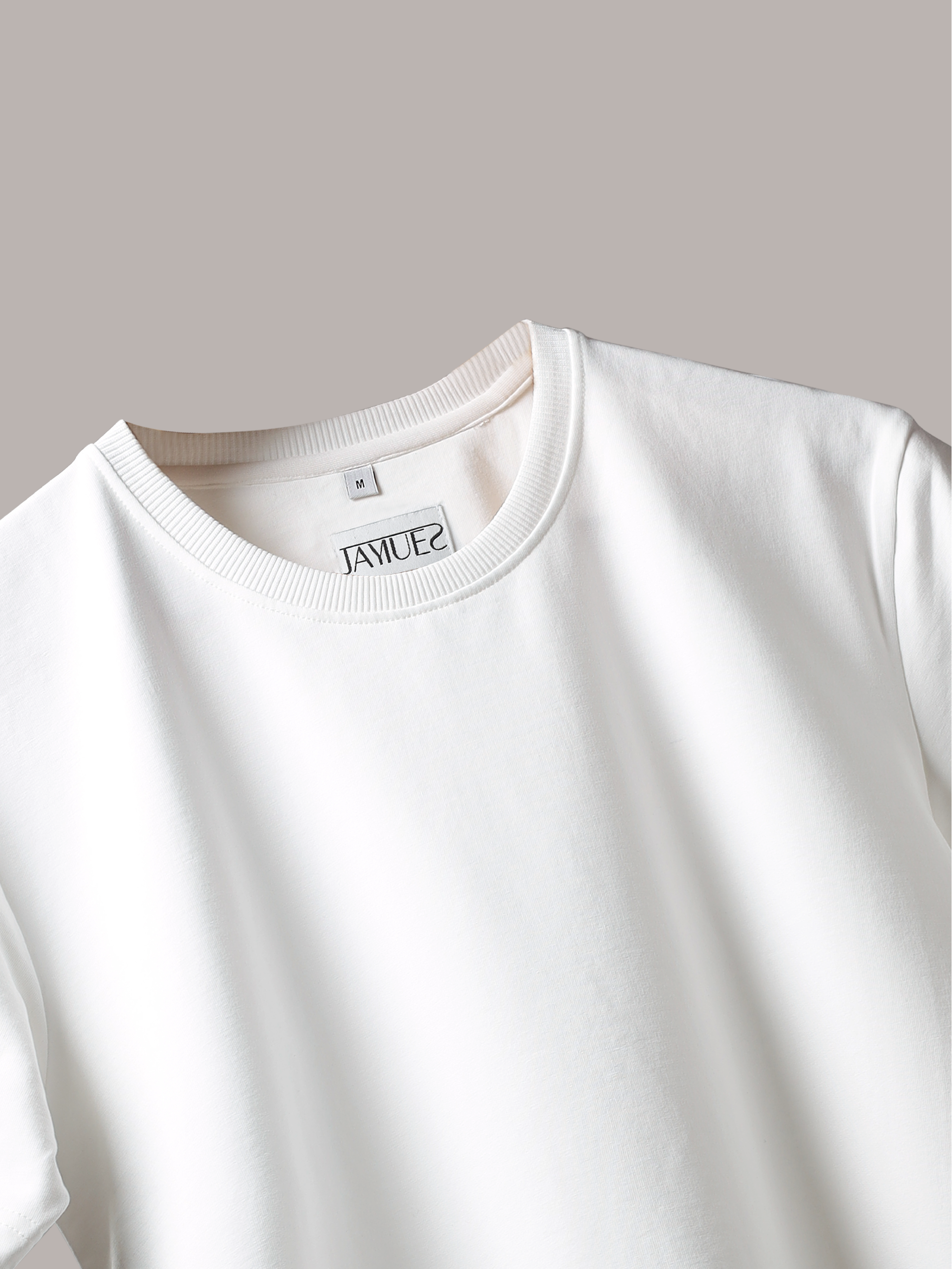 Jayhues White basic t-shirt with a brand label on a light gray background