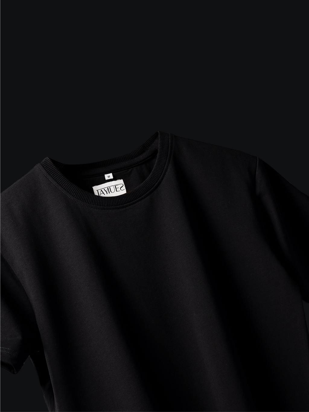 Jayhues black basic t-shirt with a brand label on a black background