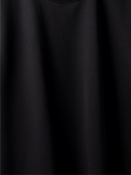Close-up of a plain black t-shirt with a soft texture.