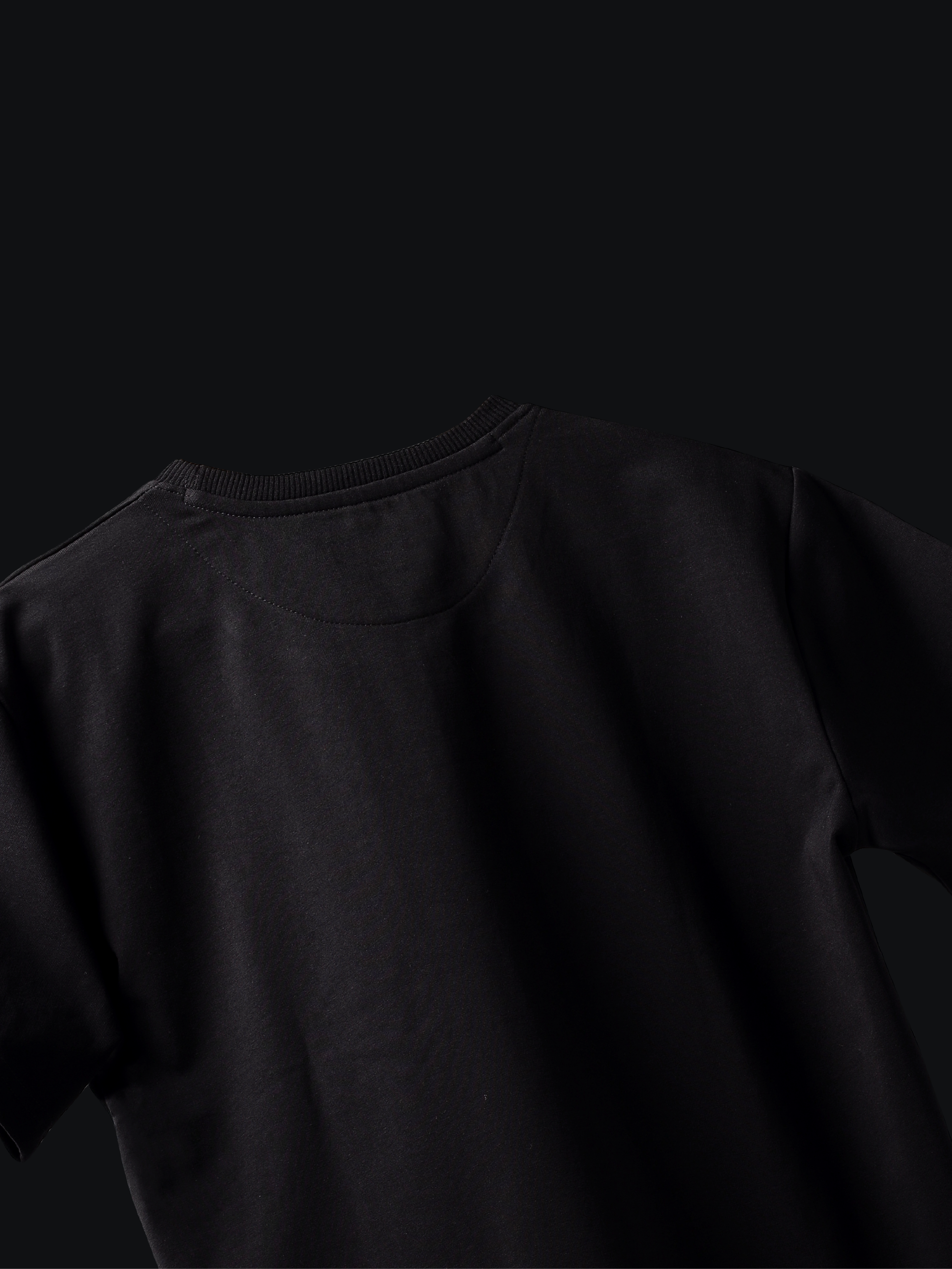 Jayhues black basic t-shirt on a black background