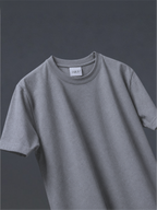 The grey basic t-shirt, shown against a dark grey background.