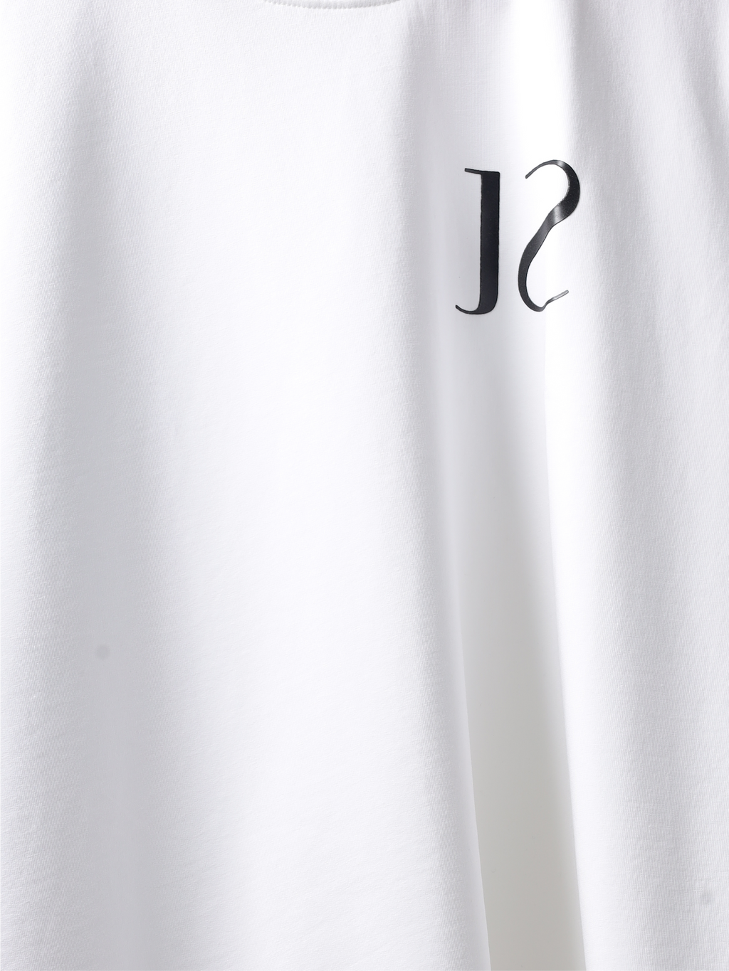 closeup of the White jayhues marque t-shirt front side.