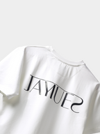 White jayhues marque t-shirt backside with black hd jayhues logo on a light gray background