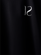 closeup of Black jayhues marque t-shirt front side.