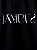 Closeup of white hd jayhues logo on the backside of Black jayhues marque t-shirt. 
