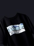 Black antarctic emperor oversized t-shirt on a dark background.