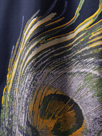 Back closeup of Navy peacock feather oversized t-shirt.