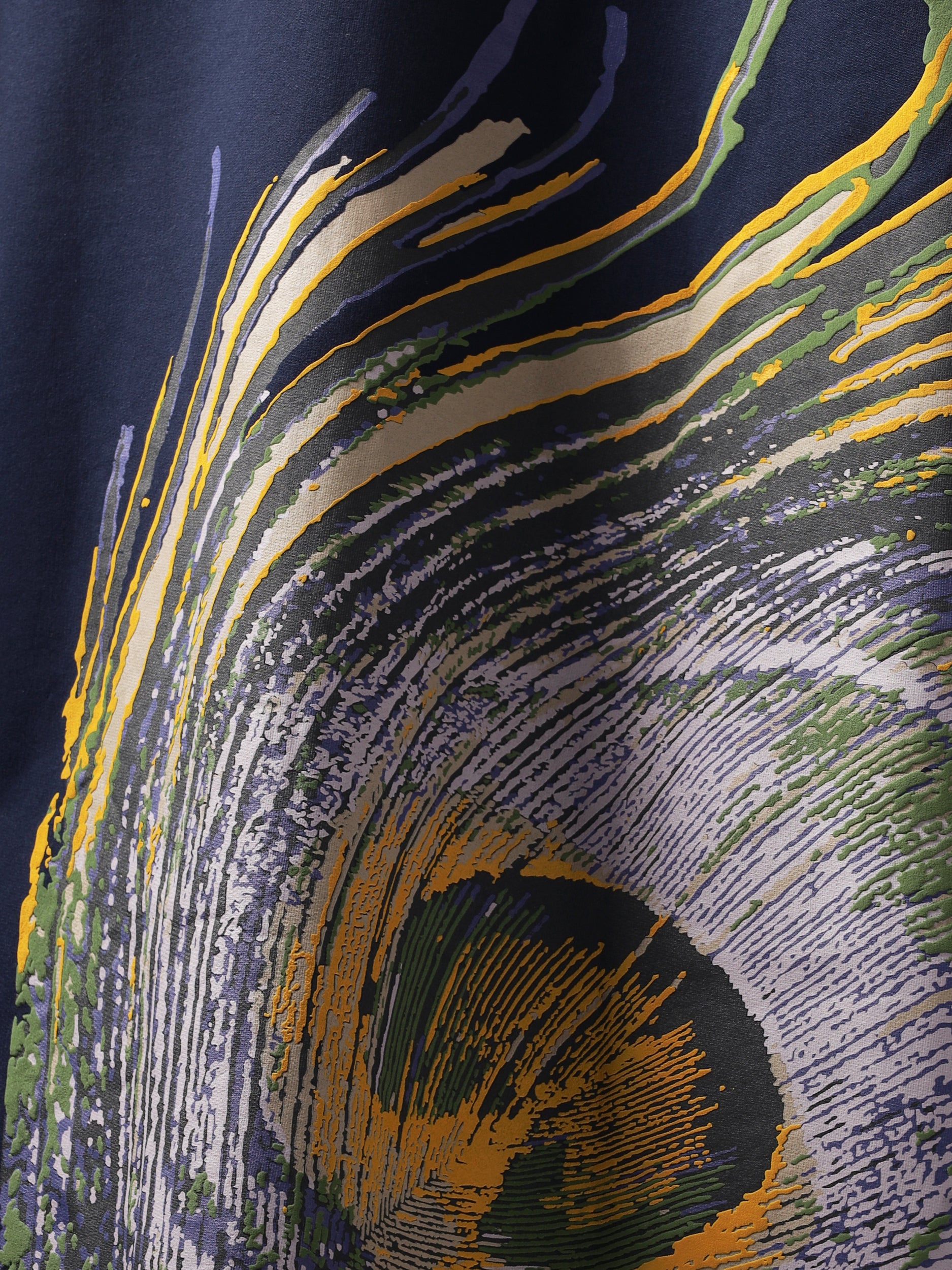 Back closeup of Navy peacock feather oversized t-shirt.